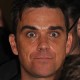 Robbie Williams'as kovos dėl šių metų kalėdinio hito numeris vienas