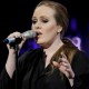 Mįslinga žinute Adele užsiminė apie šiemet išleidžiamą naują albumą